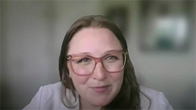 Amy Rencher smiles in a webcam image.